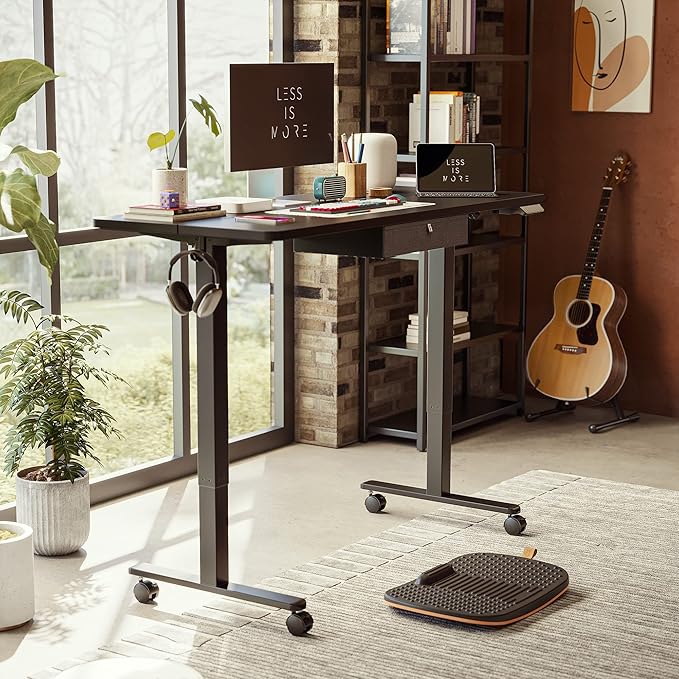 FEZIBO 63 x 24 Inches Standing Desk with Drawer, Adjustable Height Electric Stand up Desk with Storage, Sit Stand Home Office Desk, Ergonomic Computer Desk, Black